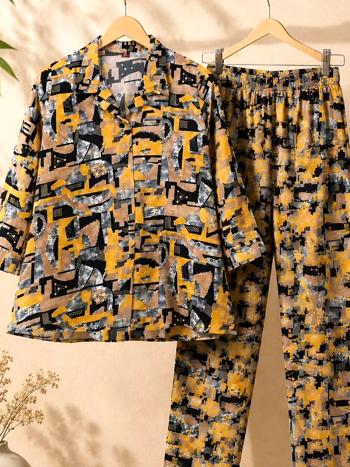 Mustard and grey mosaic print cord set on wooden hangers
