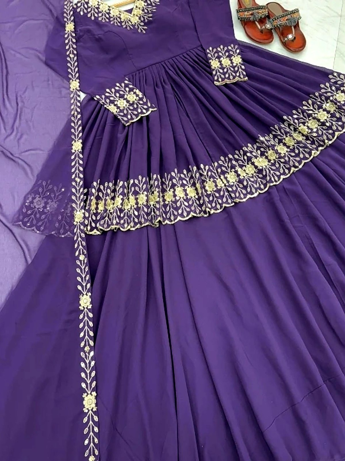 Violet flared anarkali maxi with embroidered border, laid flat