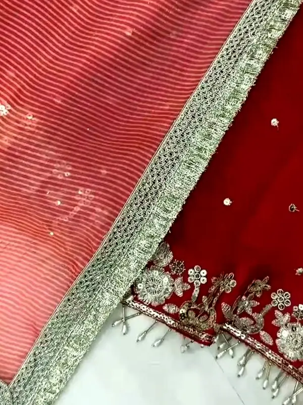 Coral striped fabric and red fabric with silver zari border and embroidery