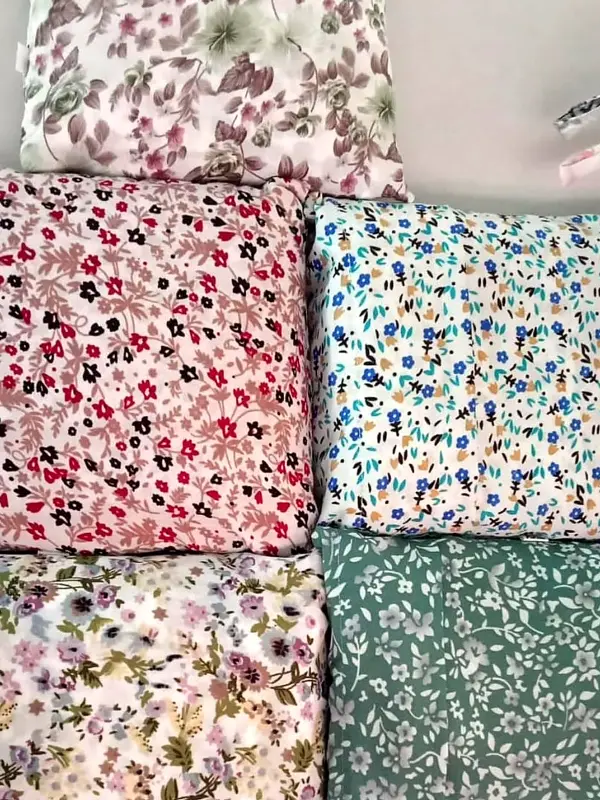 Four folded cotton salwar materials in small floral prints