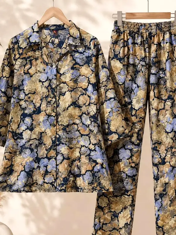 Navy and sand floral print cord set, shirt and trousers, on wooden hangers